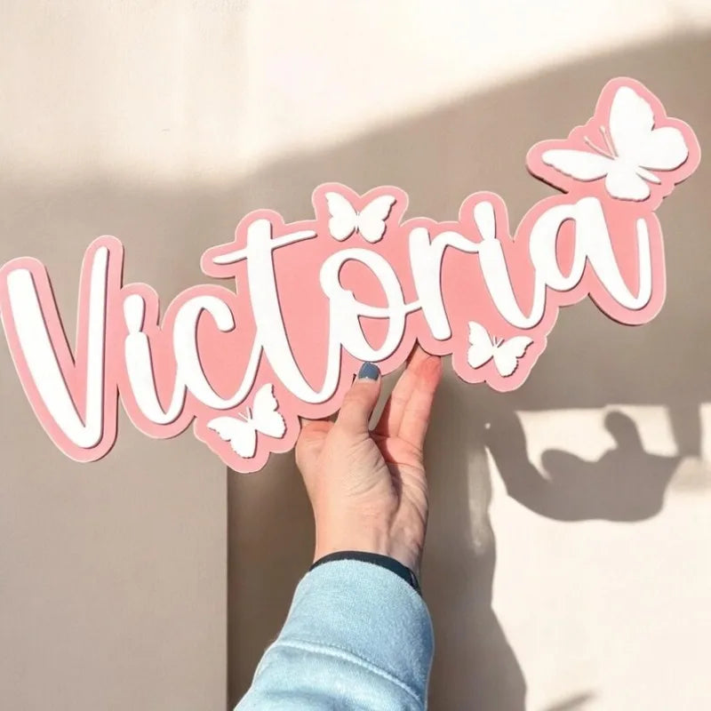 Wooden surname brand with butterfly pattern